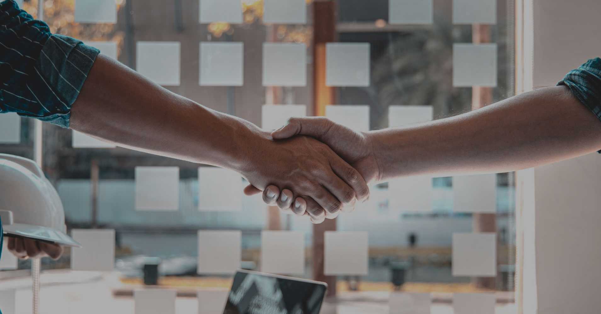 two people shaking hands