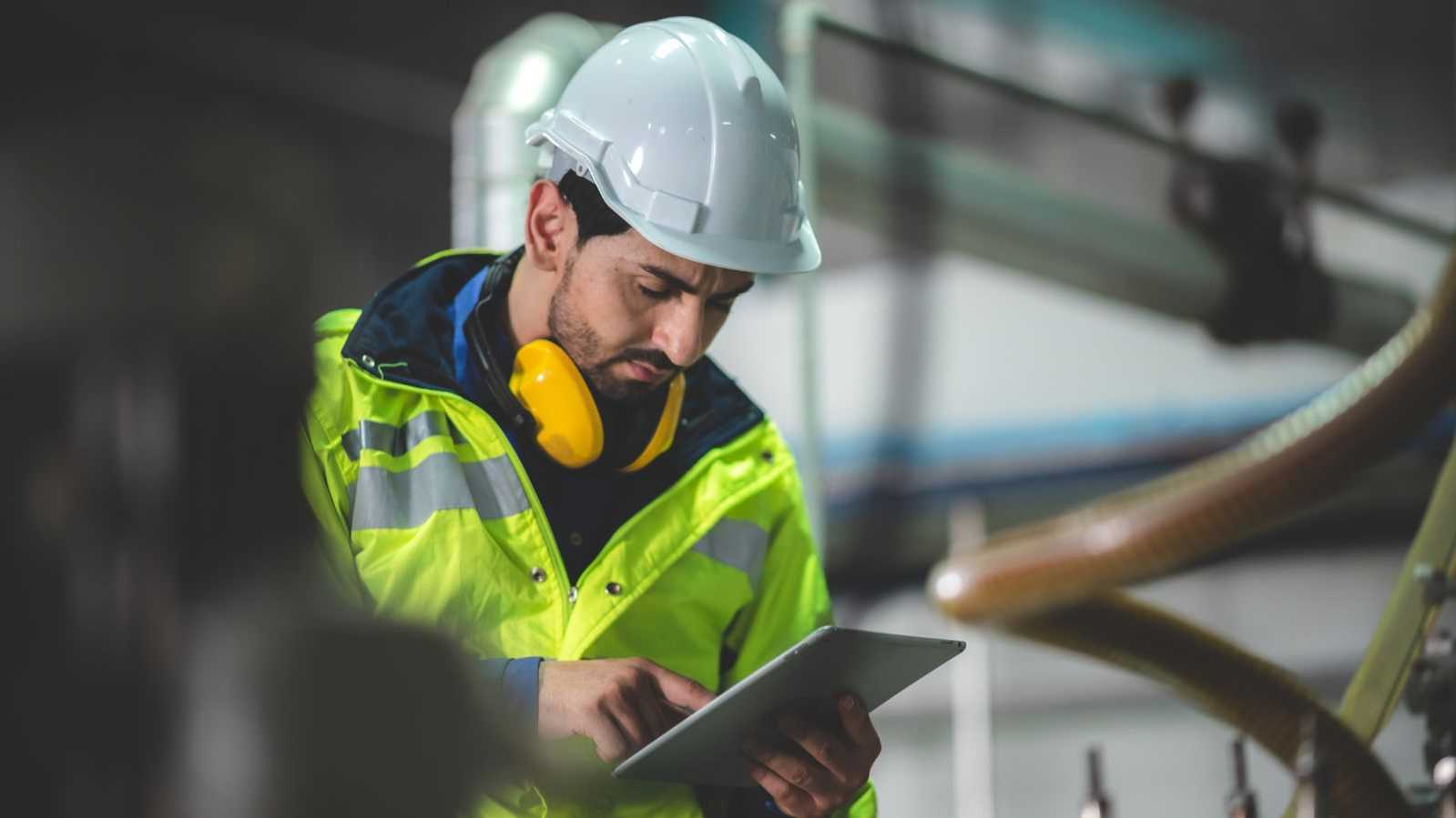 man checking equipment