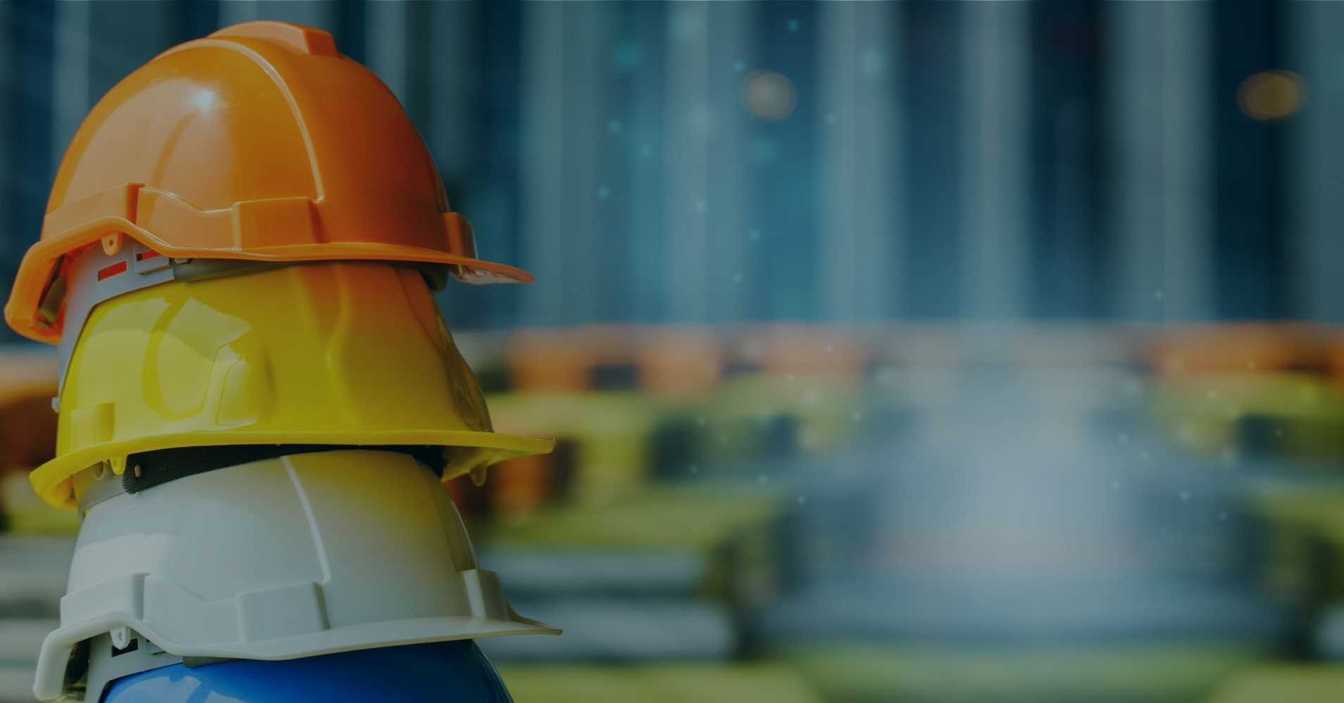 stack of construction helmets