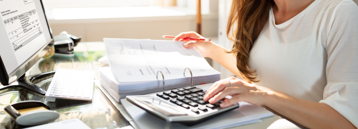 woman working on a calculator