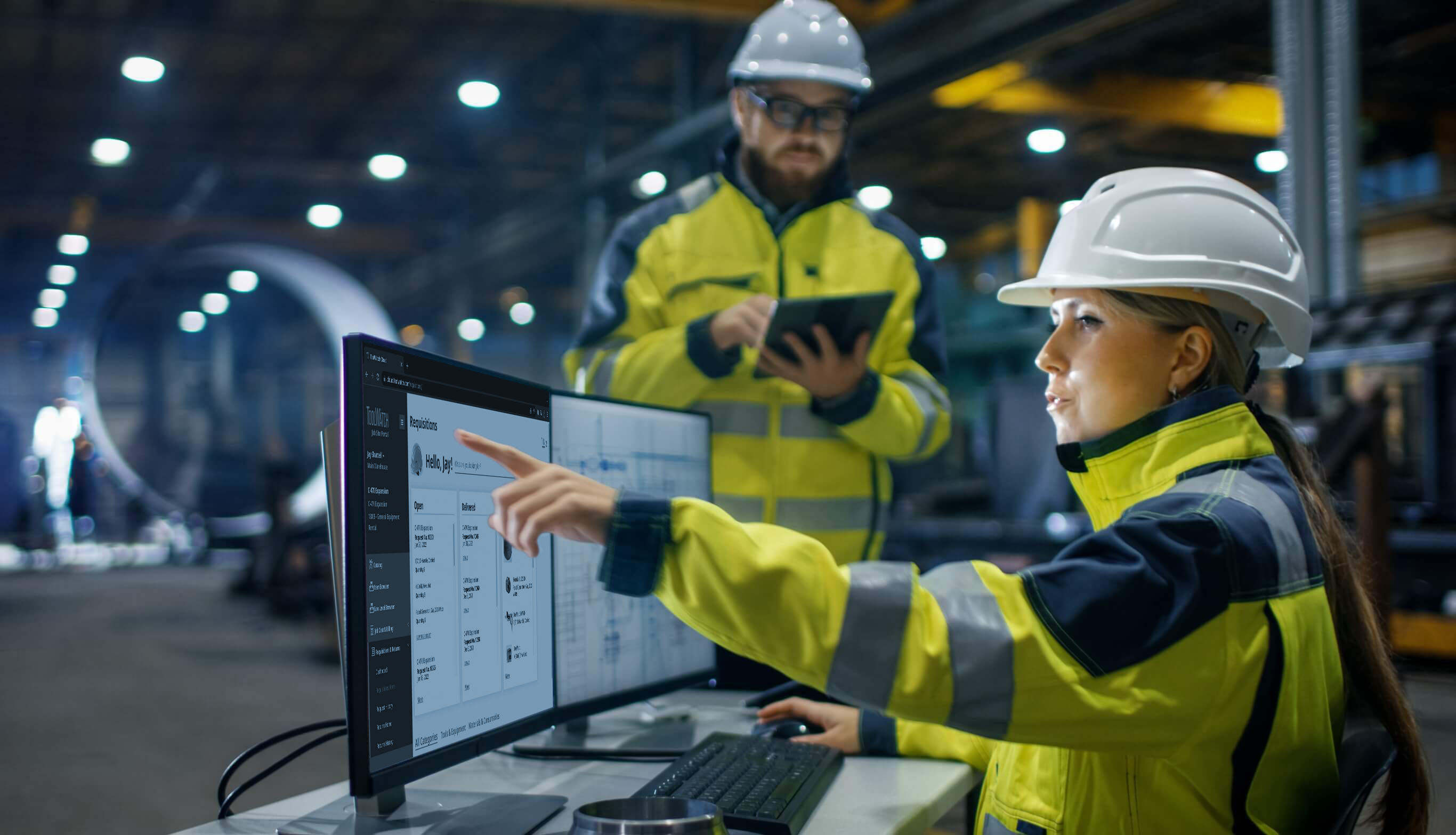 construction workers on computer