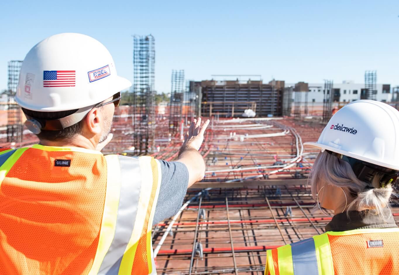 construction workers discussing job site