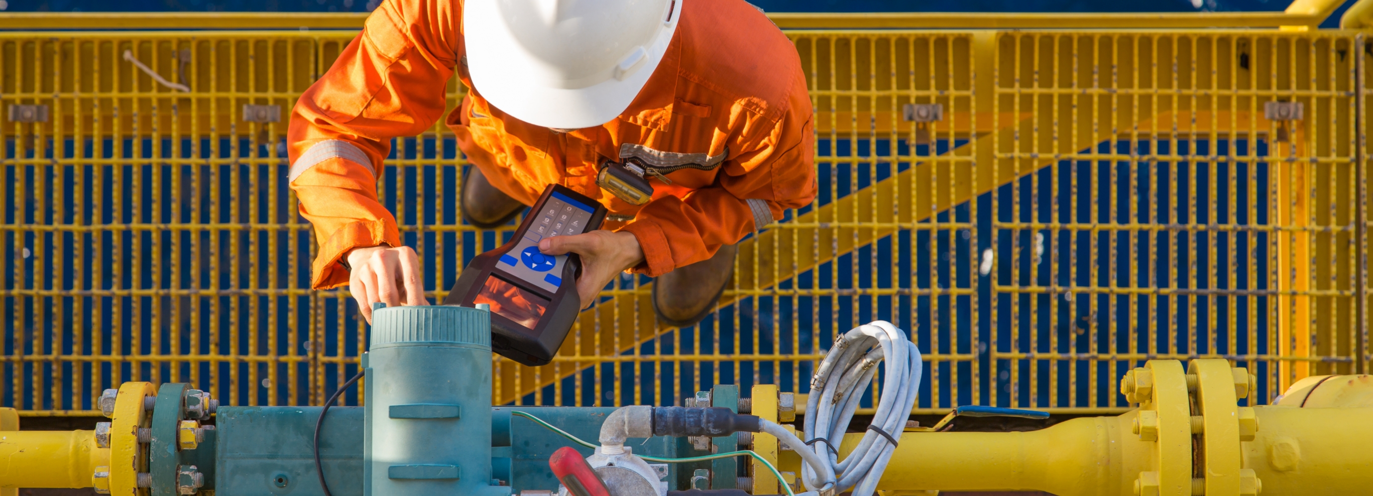 man calibrating equipment